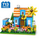 Set de Constructie cu Piese Tip Blocuri Constructie 713 Piese MiniBric House in the Flower Field